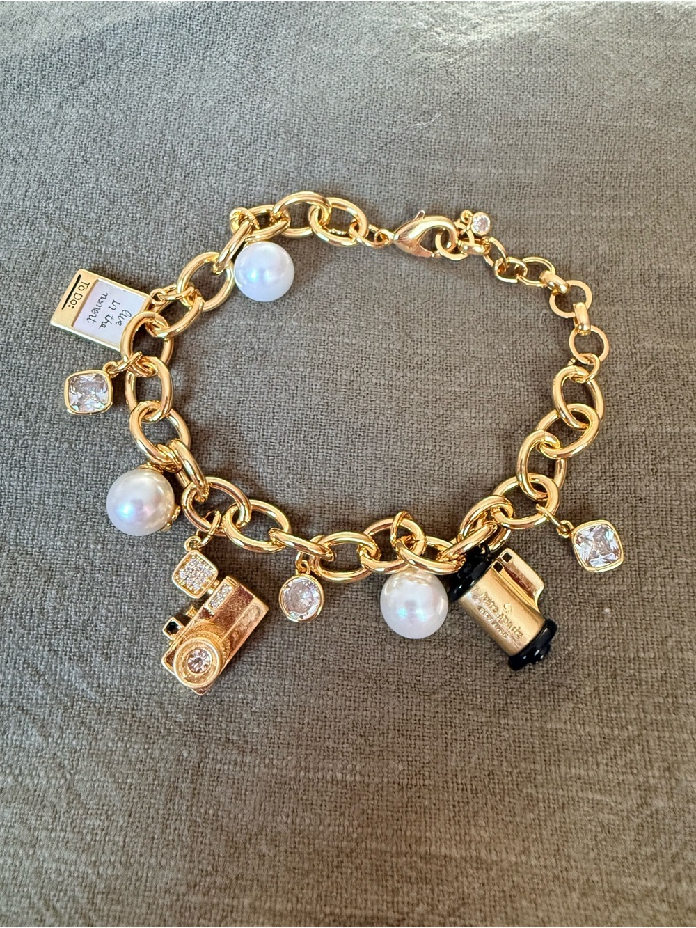 The Kate Spade Picture Perfect Camera 12K Gold Plated Brass CZ Charm Bracelet